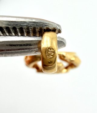 Colgante Escarabajo de oro de 18k, 1.22 g.