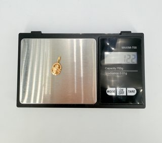 Colgante Escarabajo de oro de 18k, 1.22 g.