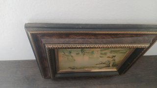 Antiguo cuadro con marco decorativo