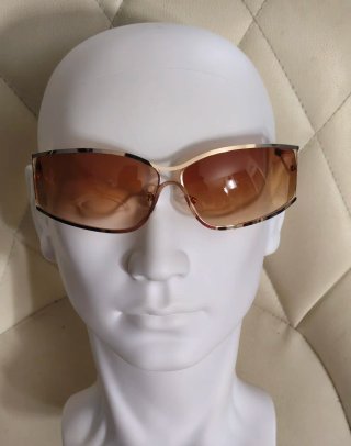 Gafas de sol doradas y marrones