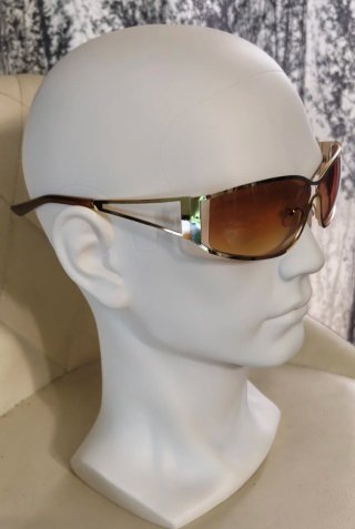 Gafas de sol doradas y marrones