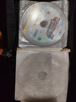 PS3 Super Slim + 3 Mandos + Estuche con 20 Juegos