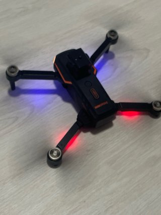 Dron Negro y Naranja con Accesorios