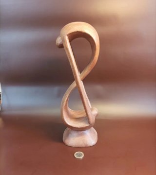 Escultura amor indivisible pareja arte abstracto