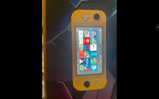 Nintendo Switch Lite Amarilla con Juegos