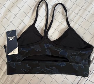 Sujetador deportivo Reebok Talla L negro y azul