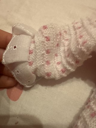 Pijama de bebé tejido rosa y blanco