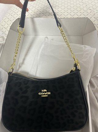 Bolso coach negro con estampado de leopardo
