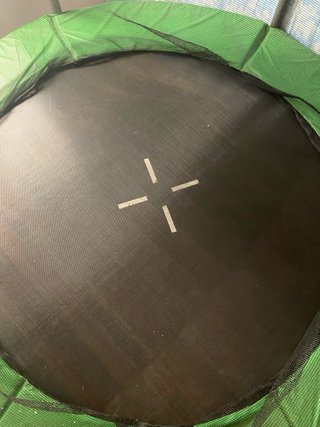 Cama elástica con red de seguridad