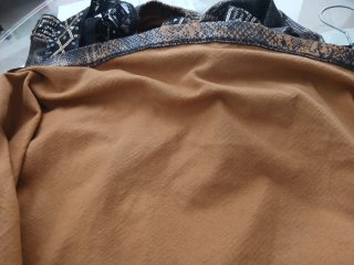 Abito rock animalier nero e marrone