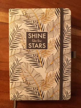 Libreta con diseño tropical y elástico