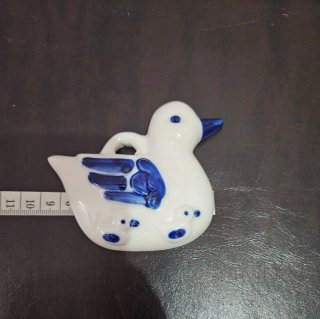 Decorazione da parete a forma di anatra