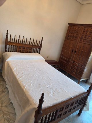Dormitorio rústico madera maciza