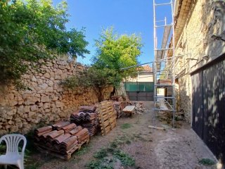 Tejas antiguas en palets