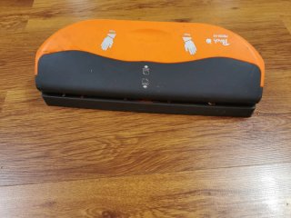 Encuadernadora de oficina naranja y gris