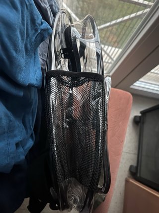 Mochila transparente con bolsillo para pines
