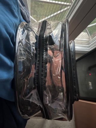 Mochila transparente con bolsillo para pines