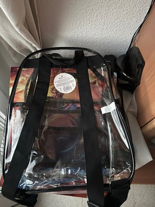 Mochila transparente con bolsillo para pines