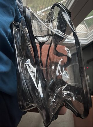 Mochila transparente con bolsillo para pines