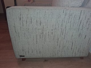 Sillón de tela beige