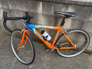 Bicicleta Orbea carretera infantil naranja