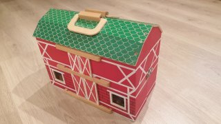 Granja de madera con animales