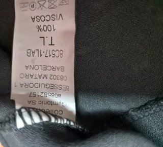 Blusa gris escote V manga abullonada