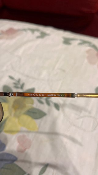 Gafas de sol Gucci doradas y marrones