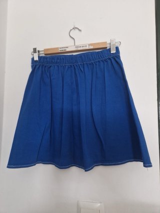 Falda mini azul con botones
