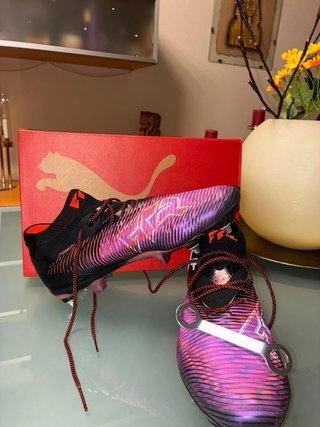 Botas de fútbol Puma Future alta gama.