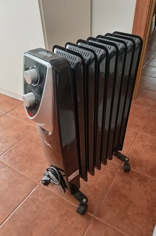 Estufa Radiador Aceite Negro y Plata