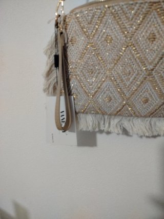Borsa/pochette beige e oro con frange