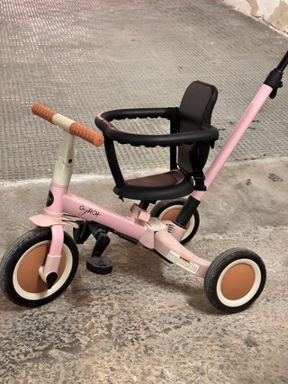 Triciclo infantil rosa con toldo