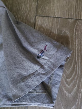 Polo Greg Norman Beige arena.