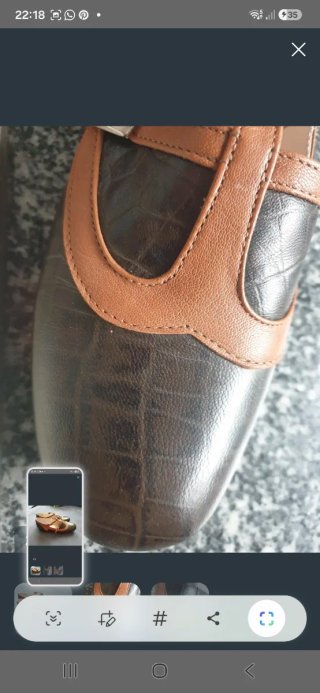 Zapatos de piel negros y marrones