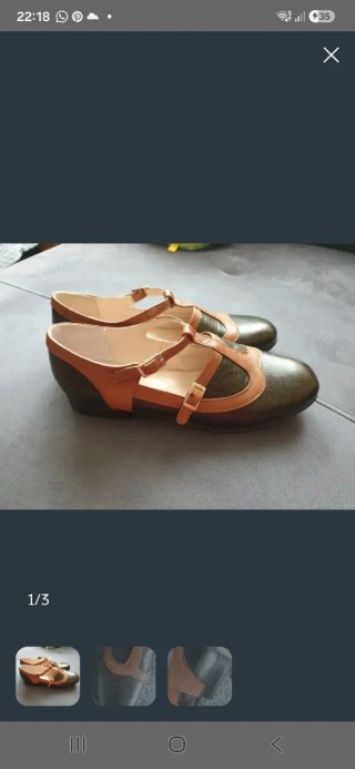 Zapatos de piel negros y marrones