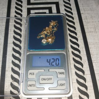 Cadena de oro 18 quilates con colgante