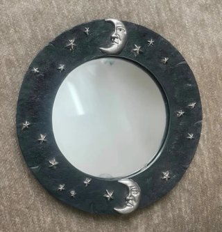 Espejo redondo con lunas y estrellas
