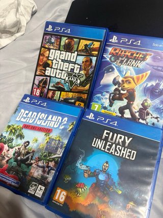 PS4 (PlayStation 4) + 4 Juegos