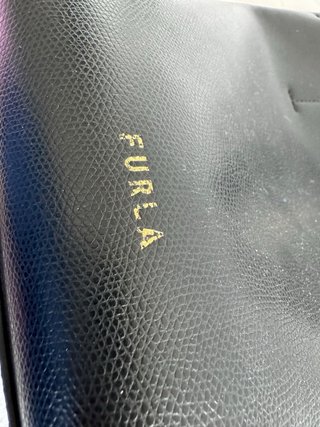 Bolso Furla de piel negro · tipo saco · asas de ma