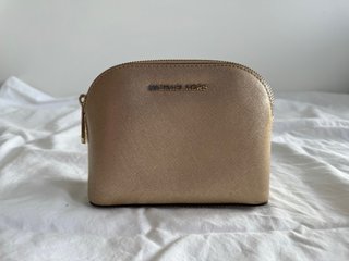 Neceser Michael Kors dorado de piel · pouch