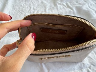 Neceser Michael Kors dorado de piel · pouch