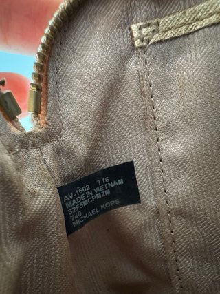 Neceser Michael Kors dorado de piel · pouch
