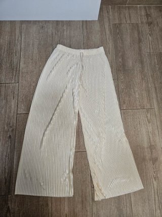 Pantalones anchos plisados 3 por 10