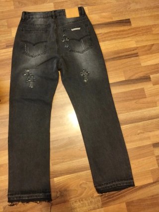 Vaqueros Chrome Hearts Negros