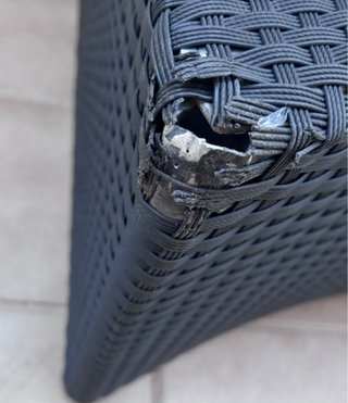 Sillón de ratán negro