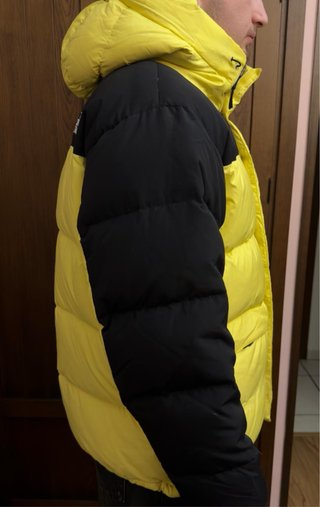 The North Face plumífero amarillo y negro