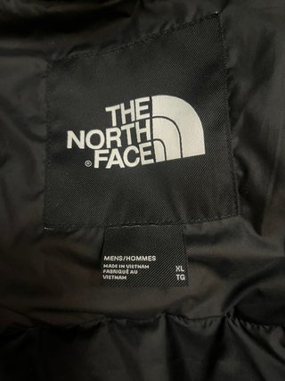 The North Face plumífero amarillo y negro