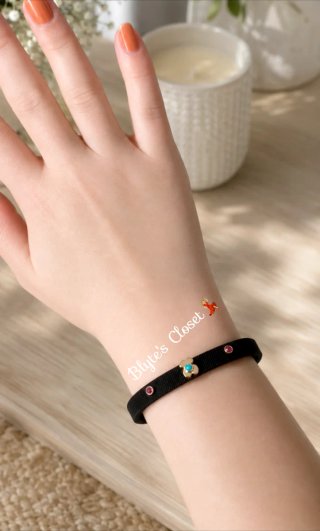 Pulsera Tous Negra y Dorada
