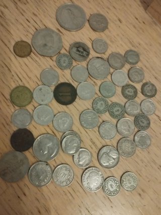 Lote de monedas antiguas, algunas de plata